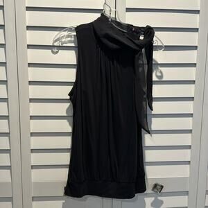 Ann Taylor Pre Loved Top with scarf alike detail on top.